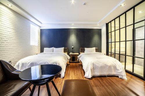 Postel nebo postele na pokoji v ubytování Hotel Stay 53