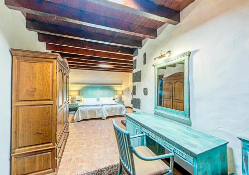 A bed or beds in a room at Apartamentos Rurales Islas Canarias