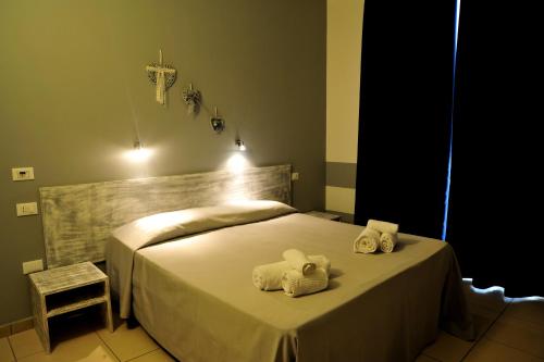 Katil atau katil-katil dalam bilik di Hotel La Punta