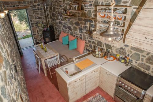 an aerial view of a kitchen and dining area in a tiny house at Trahilas House in Mochlos