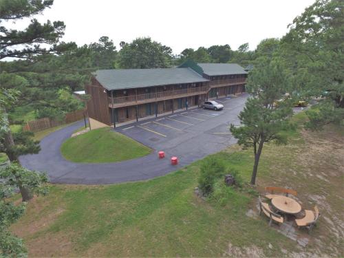 an aerial view of a building with a parking lot at Country Mountain Inn in Eureka Springs