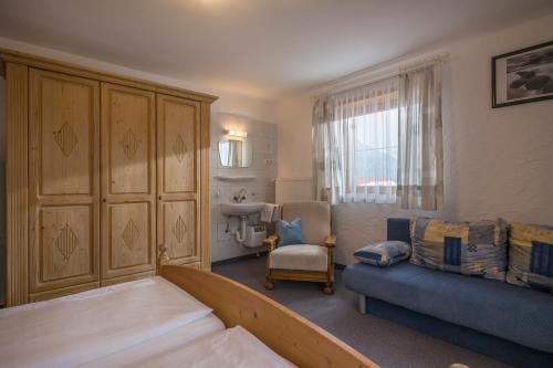 A bed or beds in a room at Ferienhaus Resi & Obermoser