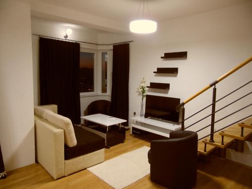 Ruang duduk di Ohrid Sunset Apartments Velestovo