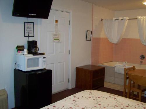 Golden Knight Inn and Suitesにあるベッド