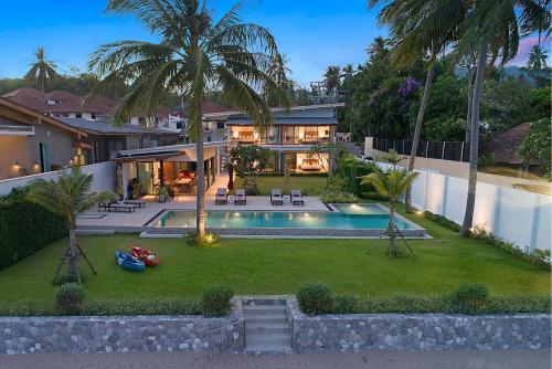 an aerial view of a house with a swimming pool at Villa SeaNest Samui in Laem Sor