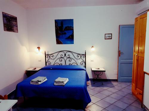 Katil atau katil-katil dalam bilik di Lo Nardo Accommodation