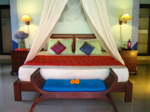 Postel nebo postele na pokoji v ubytování Villa Shantitara Bungalows