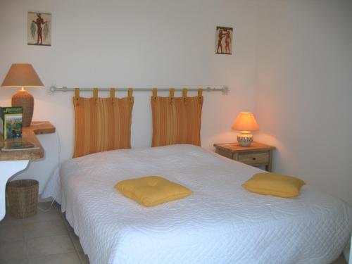 Posteľ alebo postele v izbe v ubytovaní Les Restanques