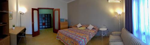 A bed or beds in a room at Roma Cinecittà Free WI-FI