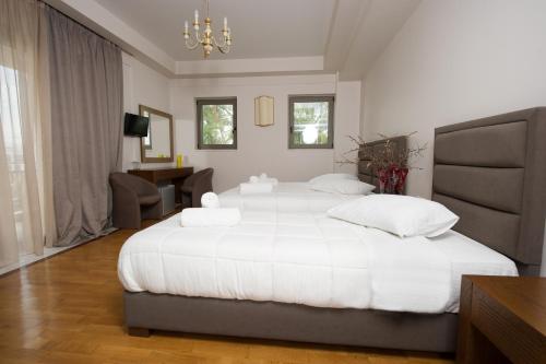 Posteľ alebo postele v izbe v ubytovaní Corali Resort