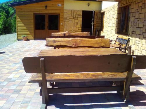 a couple of beds sitting on a patio at Jeleni Skok in Cisna