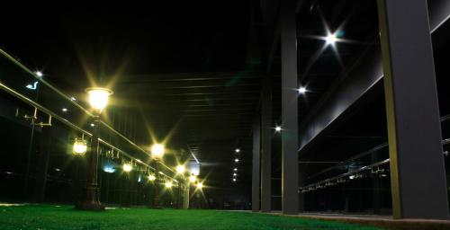 a row of street lights at night at H2H - Nichole Maison - Majestic Ipoh in Ipoh