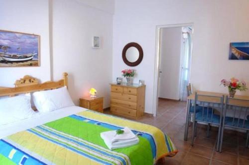 Ένα ή περισσότερα κρεβάτια σε δωμάτιο στο Karabo Hotel