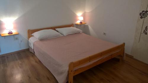 Postel nebo postele na pokoji v ubytování Apartment Kate