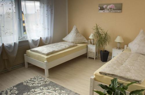 Ένα ή περισσότερα κρεβάτια σε δωμάτιο στο Bella Casa