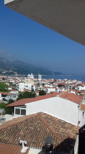 a view of a city from the roof of a building at Green Hill Studios & Apartments in Kokkari