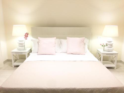 Кровать или кровати в номере Flowers Sweet Rooms B&B