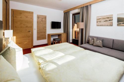 Cama o camas de una habitación en Haus Kaschutnig