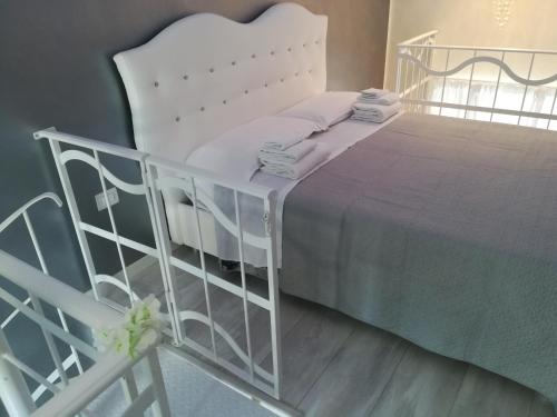 Ένα ή περισσότερα κρεβάτια σε δωμάτιο στο Casa D'Amore