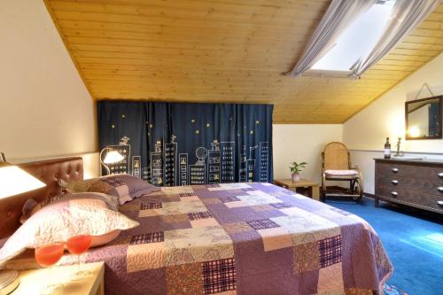 a bedroom with a bed and a large window at San Rocco Apartment in Corfu