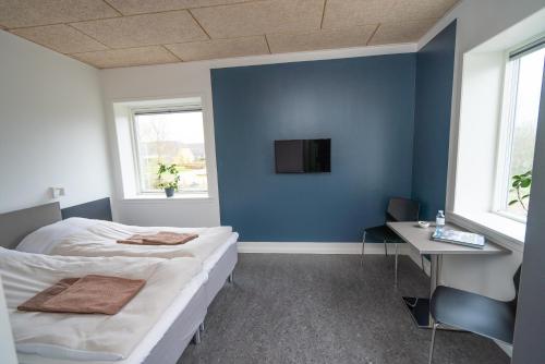 Postel nebo postele na pokoji v ubytování ICV SleepWell