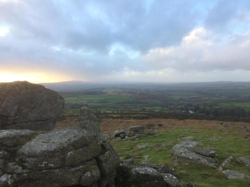 a view from the top of a hill with rocks at Oak Lodge in Tavistock