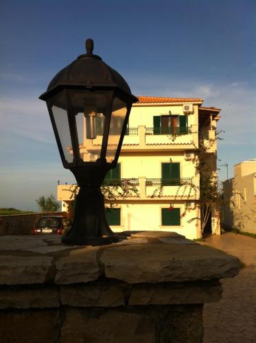 a street light in front of a building at Betsis Apartments in Kipseli