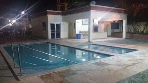 A piscina localizada em Apartamento em Natal/RN ou nos arredores