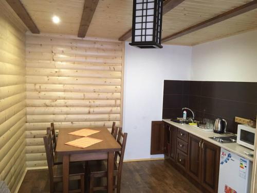 Kuchyň nebo kuchyňský kout v ubytování Holidaj Home