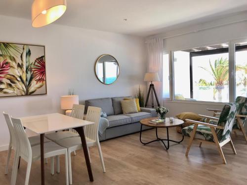 Et opholdsområde på Apartamento Seaview