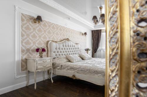Giường trong phòng chung tại President Jacuzzi Apartment by LIUKSAI