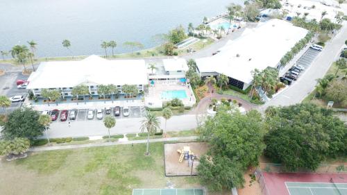 an overhead view of a building with a pool at TAMPA BAY, BEACH step away, WIFI, FREE PARKING,POOLS, JACUZZI in Ruskin