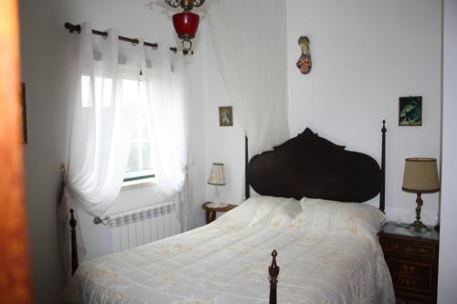 Ένα ή περισσότερα κρεβάτια σε δωμάτιο στο Quinta de S. Luis - Valada