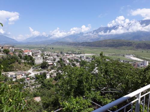 a view of a city with mountains in the background at Guest House Argjiro Castle in Gjirokastër
