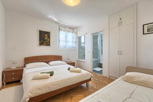 Postel nebo postele na pokoji v ubytování Villa Kascuni
