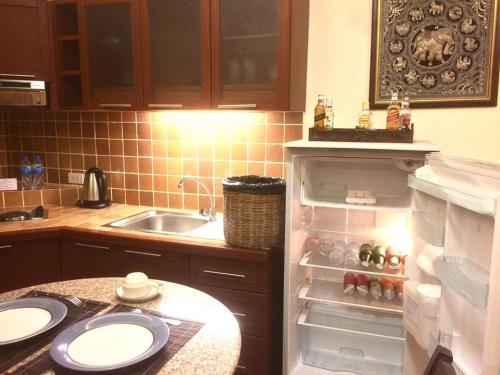 Kjøkken eller kjøkkenkrok på Nirvana Boutique Suites
