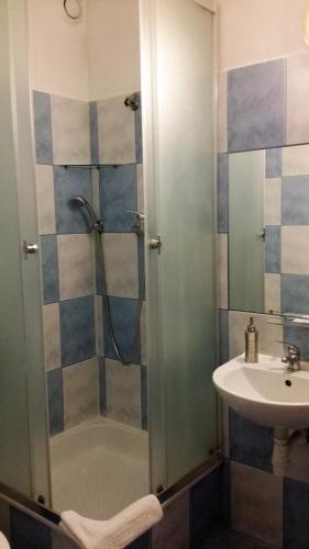 a bathroom with a shower and a sink at Hotel As in Biała Podlaska