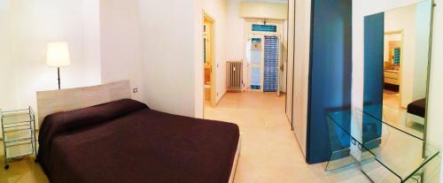 Cama ou camas em um quarto em Appartamento Suite Antiche Terme - Zero Barriere
