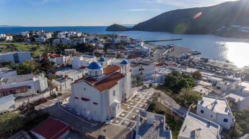 an aerial view of a town next to a body of water at The Veranda of Gavrion-Exclusive, Centrally located with Seaview in Gavrion