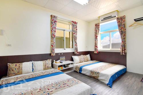 Postel nebo postele na pokoji v ubytování Xiang Ting Homestay