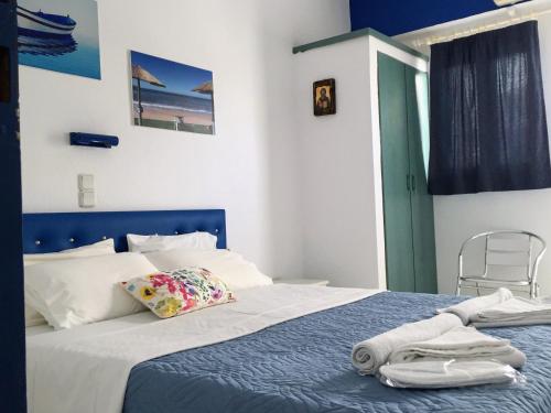 Katil atau katil-katil dalam bilik di Psaras Apartments