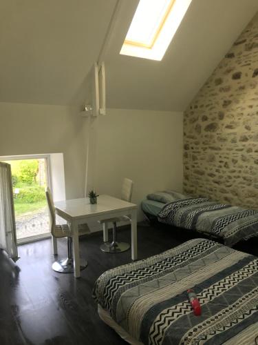 Postel nebo postele na pokoji v ubytování Chez Natacha et Adrien