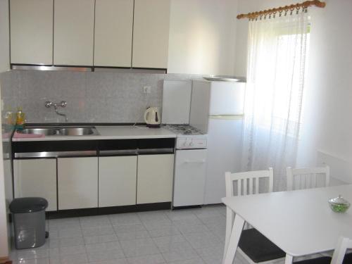Kjøkken eller kjøkkenkrok på Apartments&Rooms Milka