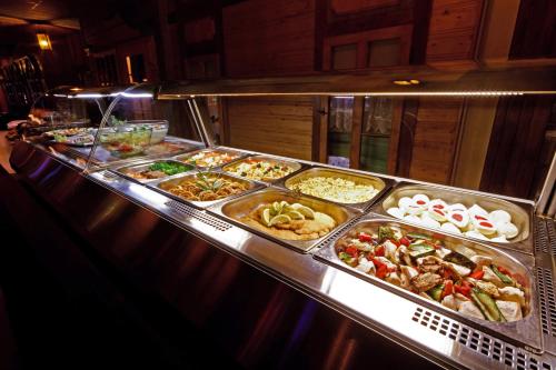 a buffet line with many different types of food at Casino & Hotel Eldorado in Česká Kubice