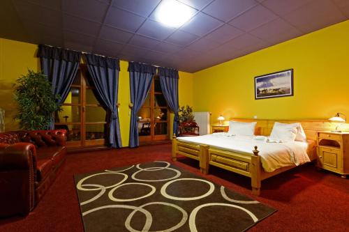Postel nebo postele na pokoji v ubytování Casino & Hotel Eldorado