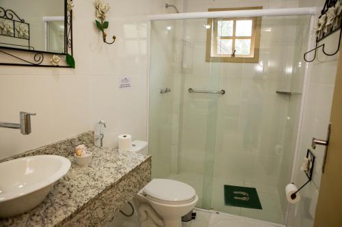 Ванная комната в Hotel Rio Penedo