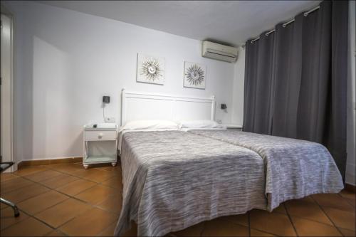 Katil atau katil-katil dalam bilik di Hostal San Ramón
