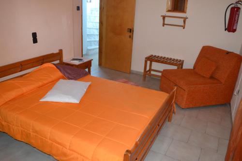 A bed or beds in a room at Noufaro studios