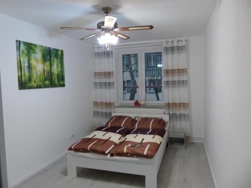 Postel nebo postele na pokoji v ubytování Ferienwohnung mit Brockenblick