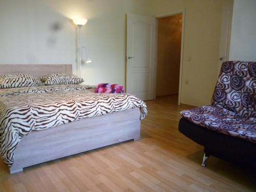 Кровать или кровати в номере Quiet Center Apartment Arena Riga FREE PARKING